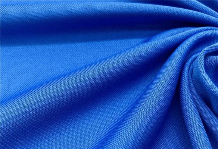 Vải Interlock giúp áo đồng phục có khả năng co giãn tốt