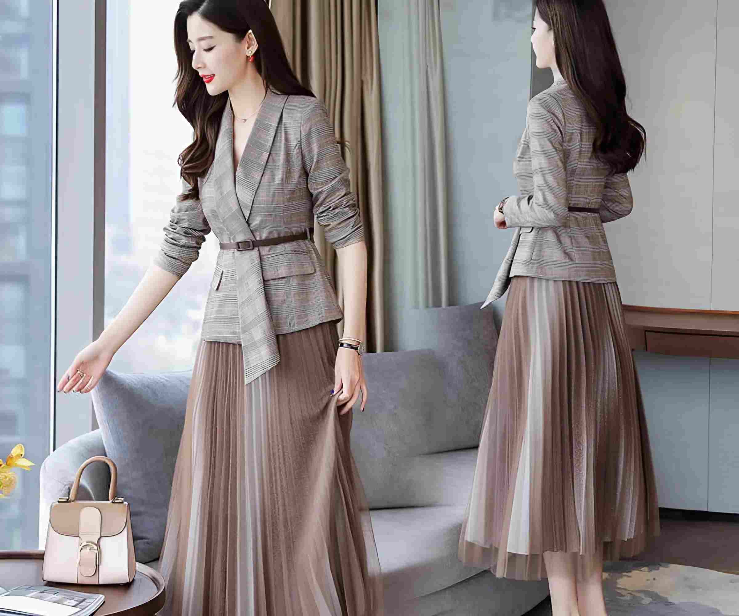 Đồng phục vest nữ phối váy dài tạo nên sự duyên dáng, nữ tính