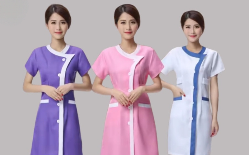Váy liền là mẫu đồng phục giáo viên mầm non nữ tính và gọn nhẹ