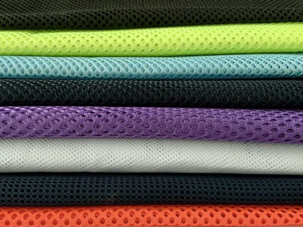 Vải thun mè là loại phổ biến khi mua đồng phục học sinh thể dục