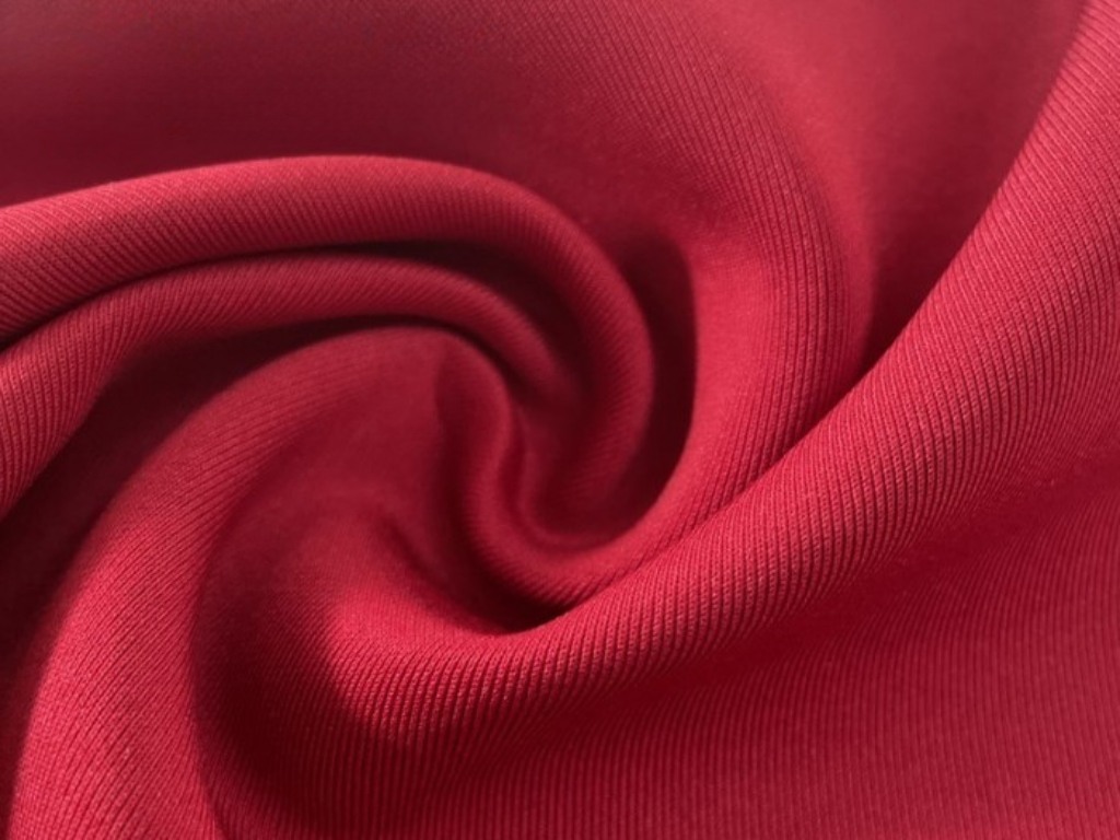 Vải interlock là gì? Câu trả lời là loại vải có cấu trúc dệt kim đôi