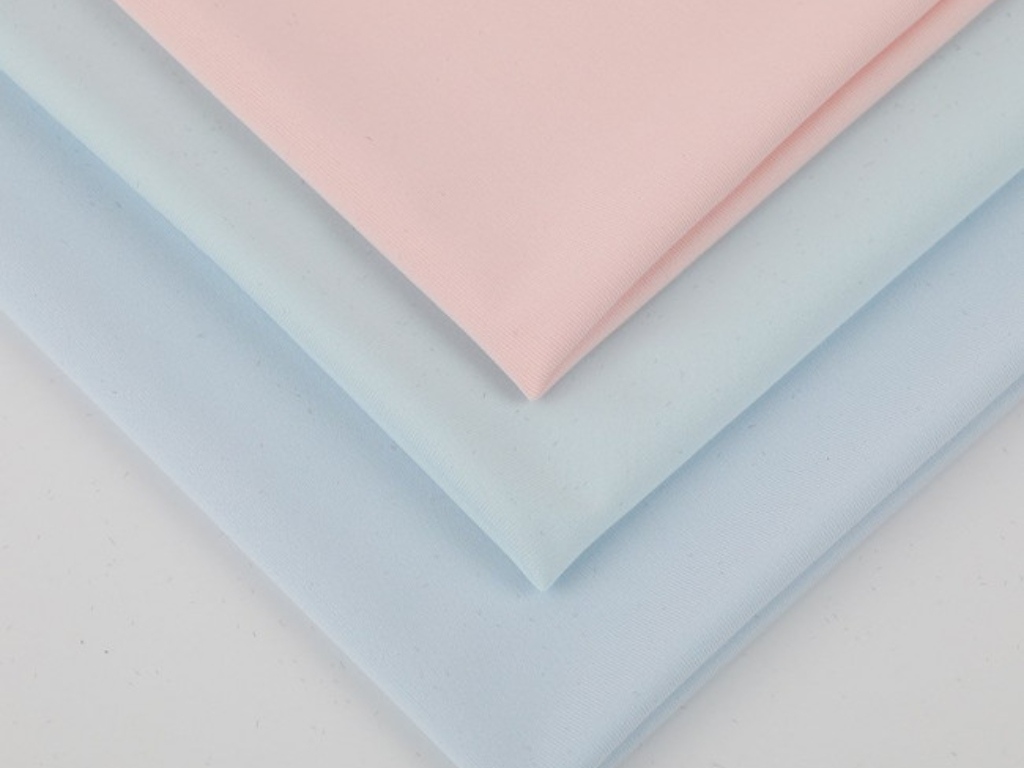 Vải Poly-Spandex kết hợp độ bền, nhanh khô của Polyester và co giãn của Spandex