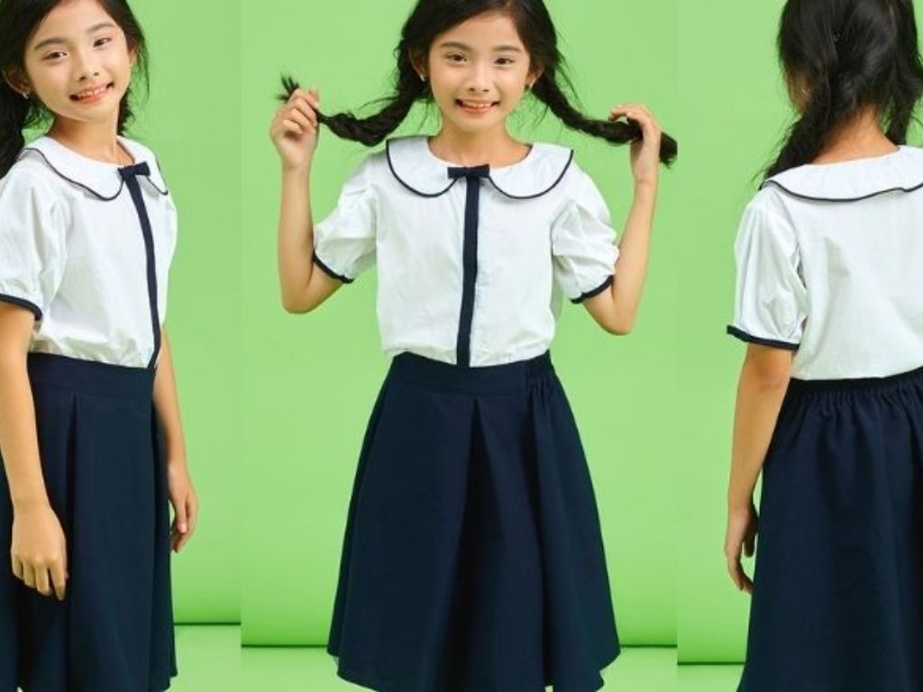 Váy xếp ly trơn màu là một lựa chọn thanh lịch của váy đẹp cho nữ sinh