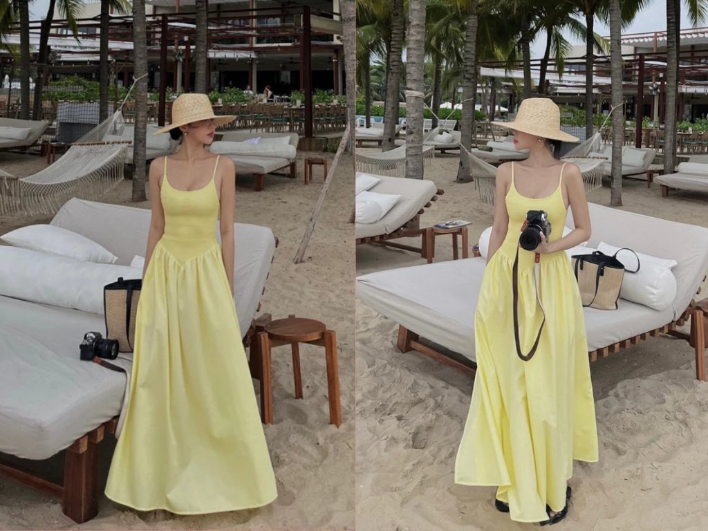 Mũ rộng vành giúp set váy đi biển thêm nổi bật và nữ tính