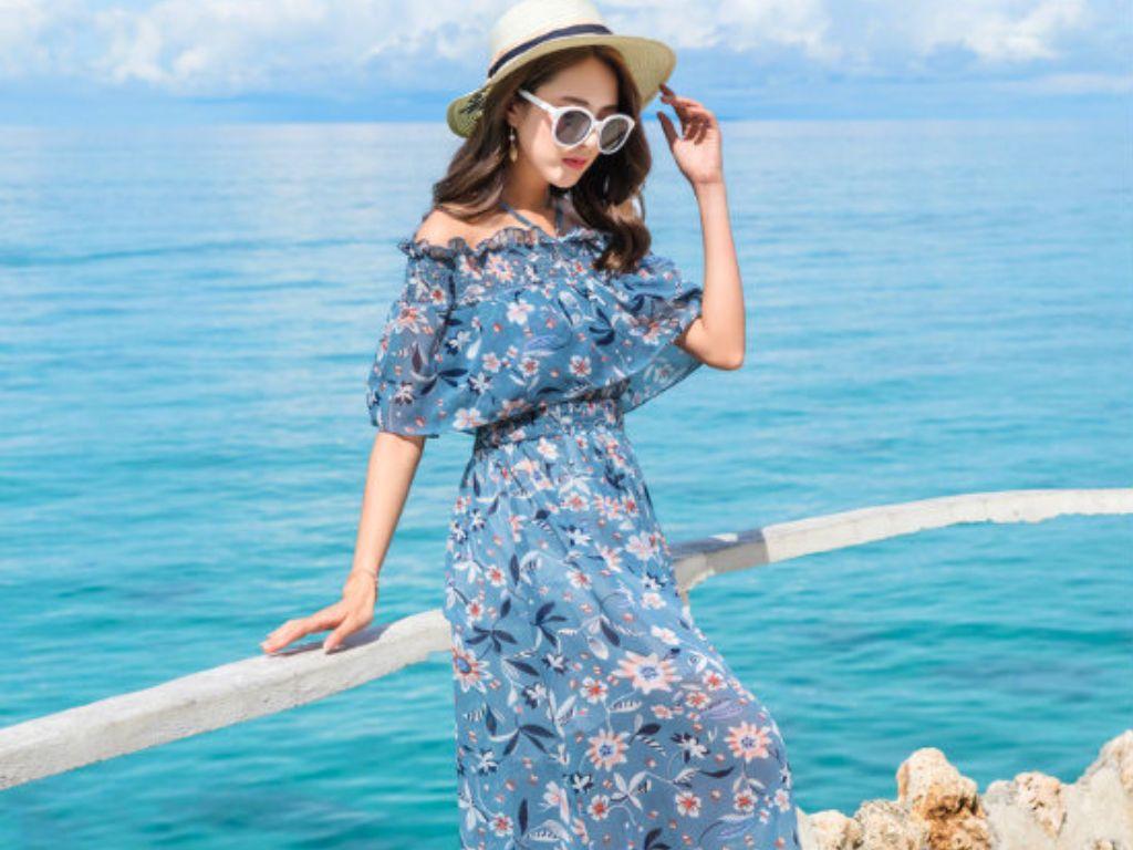 Khi chụp ảnh, bạn có thể tận dụng tà váy để tạo dáng