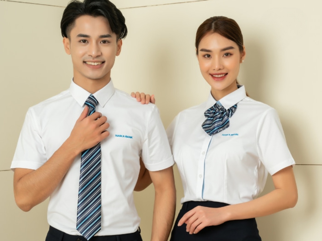 Áo sơ mi đồng phục thêu logo công ty giúp tăng cường độ nhận diện thương hiệu