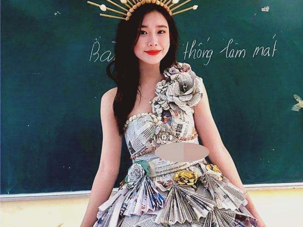 Bạn có thể sử dụng giấy báo hoặc tạp chí cũ để làm phần thân trên của váy