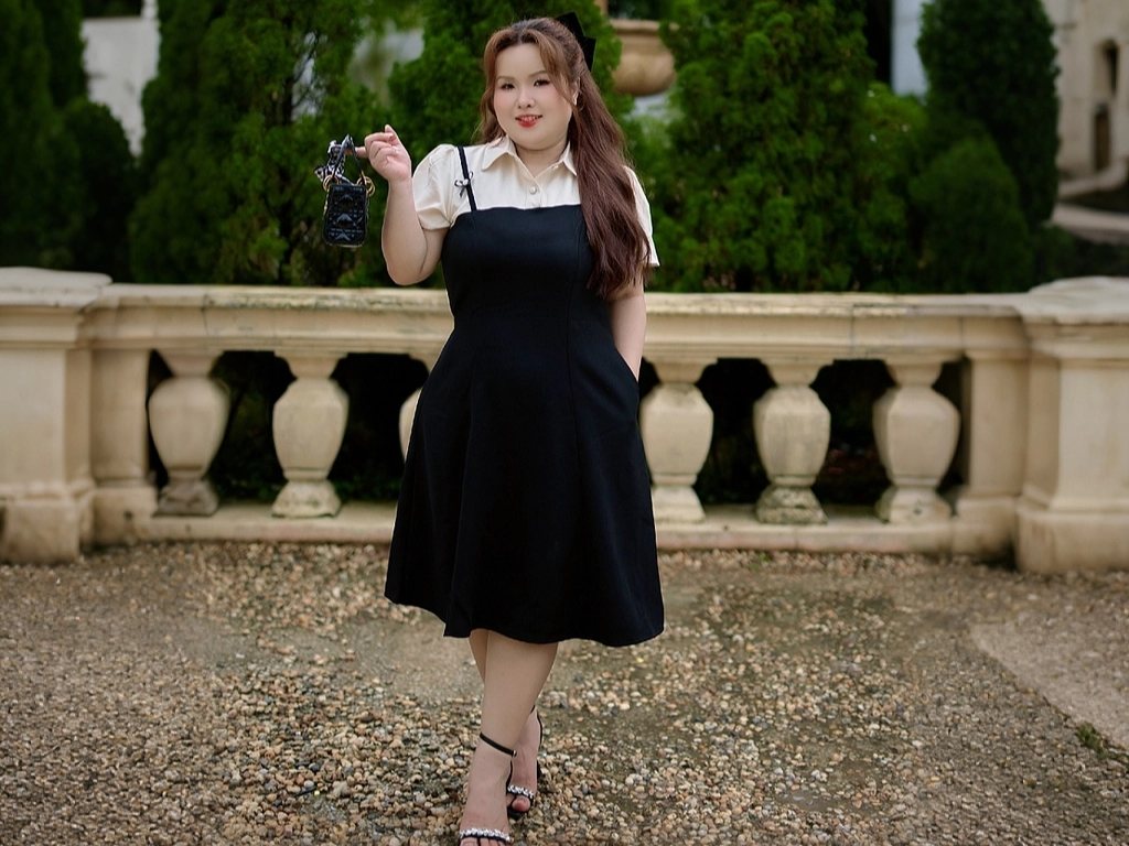 Bạn nên chọn đầm big size công sở có gam màu tối