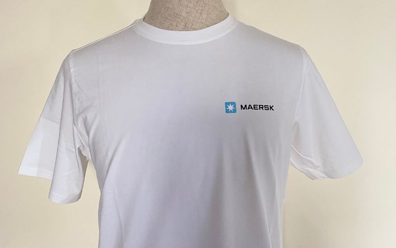 The brand logo is PET heat transferred on the front of the shirt